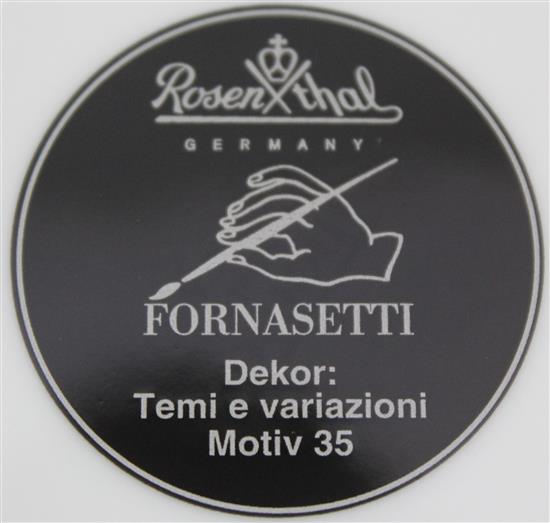 A collection of Fornasetti Temi e Variazioni and musical trophy pattern items,